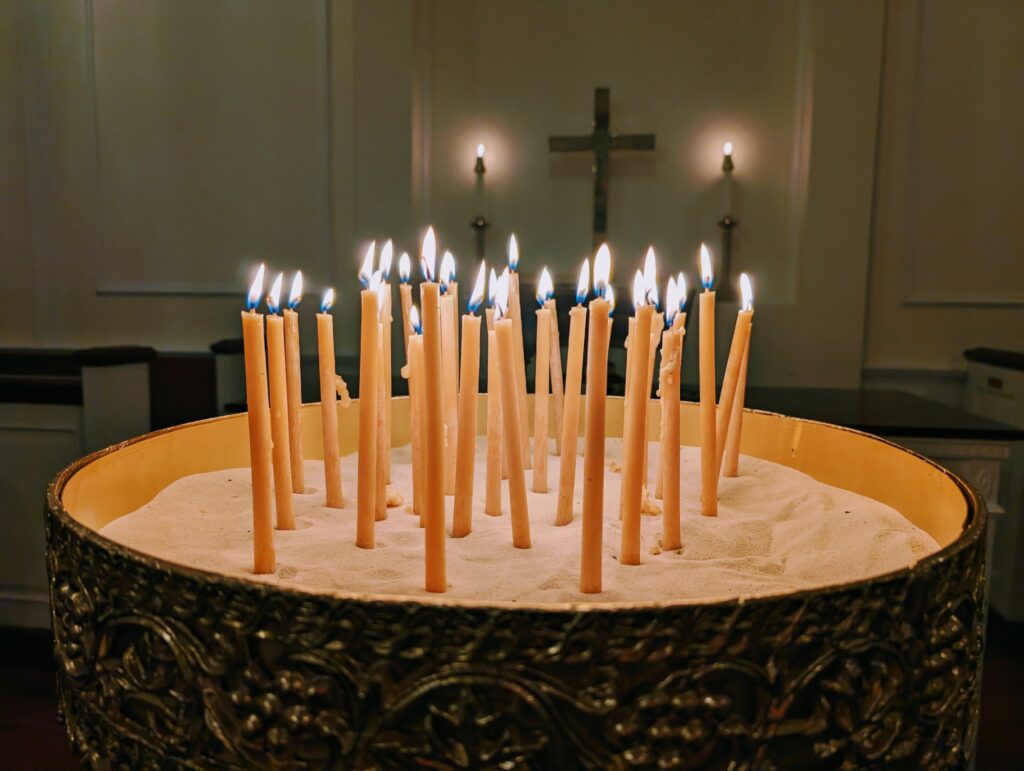 lit candles in a church