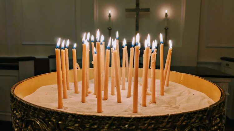 lit candles in a church